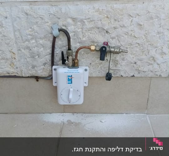 התקנת התקן חגז ושקע גז חיצוני על קיר אבן